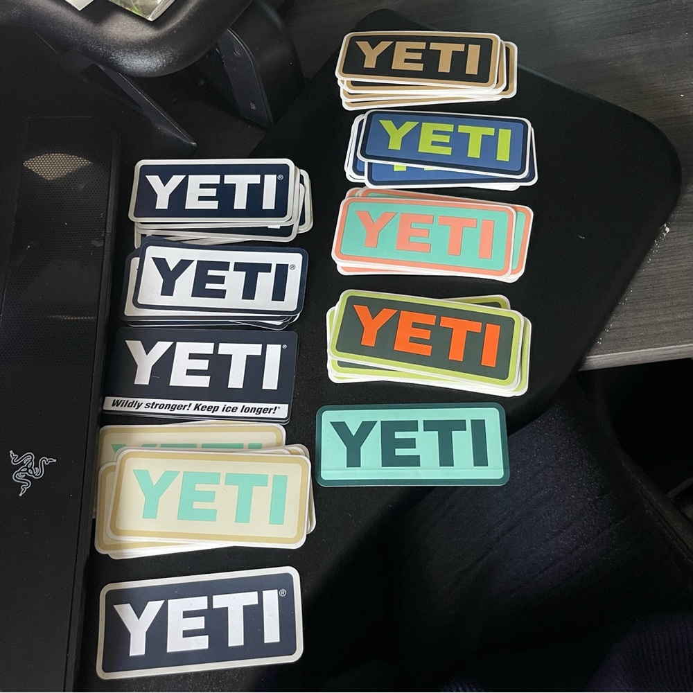 80 YETI stickers, see all photos for quantity of each